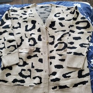 Brand new never worn animal print cardigan size large